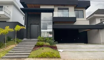 Casa à venda, belíssima arquitetura, 4 suítes, no Condomínio Jaguary!