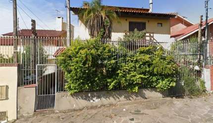 Casa em condomínio fechado com 3 quartos para alugar na Avenida Luiz Moschetti, 510, Vila João Pessoa, Porto Alegre, 280 m2 por R$ 3.500