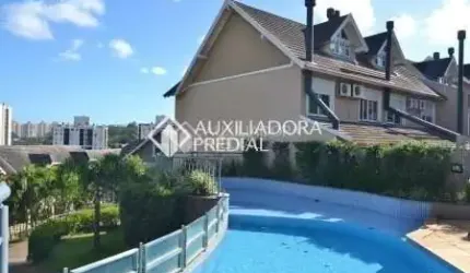 Casa em condomínio fechado com 5 quartos para alugar na Rua Attílio Bilibio, 120, Jardim Carvalho, Porto Alegre, 375 m2 por R$ 15.000