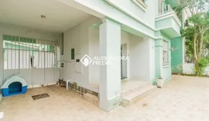 Casa em condomínio fechado com 3 quartos para alugar na Rua Xavier Ferreira, 113, Auxiliadora, Porto Alegre, 230 m2 por R$ 10.000