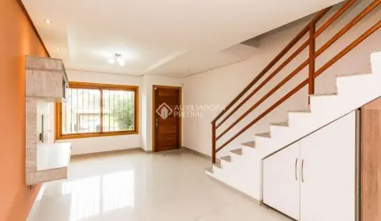 Casa em condomínio fechado com 2 quartos para alugar na Rua Heitor Kramer, 486, Guarujá, Porto Alegre, 127 m2 por R$ 3.500