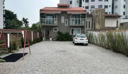 Casa com 3 quartos à venda na Rua Wilson Luz, 45, Coqueiros, Florianópolis, 133 m2 por R$ 2.299.000