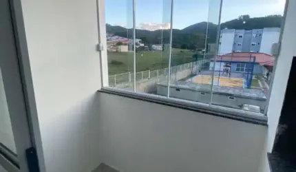 Apartamento com 2 quartos à venda na Rua Homero de Miranda Gomes, 1197, Fundos, Biguaçu, 51 m2 por R$ 247.000