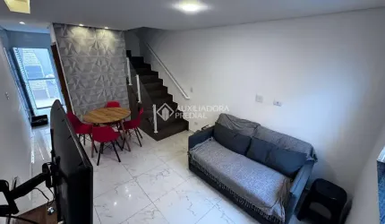 Casa em condomínio fechado com 2 quartos à venda na Rua Santa Bárbara, 392, Vila Caiçara, Praia Grande, 58 m2 por R$ 350.000