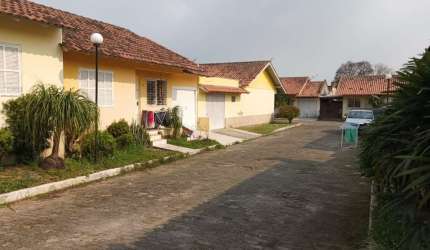 Casa em condomínio fechado com 2 quartos à venda na Rua dos Tupis, 320, Barnabé, Gravataí, 94 m2 por R$ 290.000