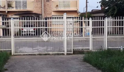Casa em condomínio fechado com 4 quartos à venda na Rua Doutor Décio Martins Costa, 915, Vila Eunice Nova, Cachoeirinha, 184 m2 por R$ 477.000