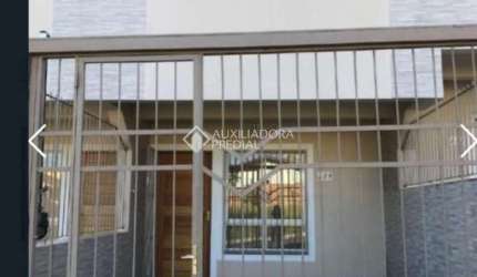 Casa com 2 quartos à venda na Avenida do Comércio, 228, Morada do Vale II, Gravataí, 130 m2 por R$ 234.000