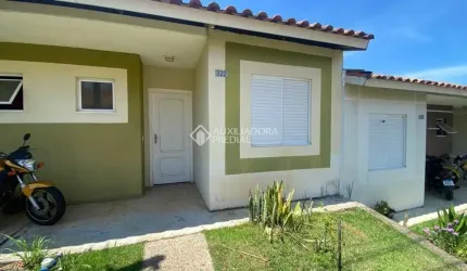 Casa em condomínio fechado com 2 quartos à venda na Rua Lino Estácio dos Santos, 1535, Oriço, Gravataí, 60 m2 por R$ 220.000