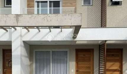 Casa em condomínio fechado com 2 quartos à venda na Rua Roberto Carlos Wagner, 800, Zona Nova, Capão da Canoa, 114 m2 por R$ 990.000
