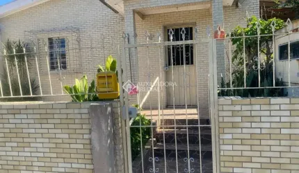 Casa com 5 quartos à venda na Rua Itacurubi, 35, Vila Nova, Porto Alegre, 100 m2 por R$ 330.000