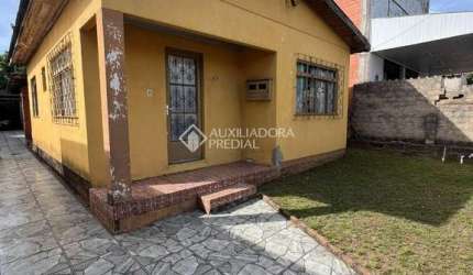 Casa com 3 quartos à venda na Presidente Kennedy, 124, Marrocos, Gravataí, 65 m2 por R$ 480.000