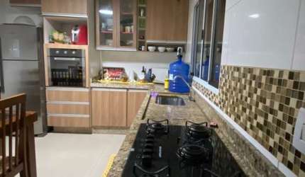 CASA TERREA A VENDA COM 2 QUARTOS SALA E COZINHA AMPLA ESPAÇO GOURMET COM CHURRASQUEIRA COM QUINTAL AMPLO 2 VAGAS COBERTAS