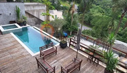Imperdível casa em condomínio à venda em Arujá-SP: 3 quartos, 1 suíte, 3 salas, 5 banheiros, 4 vagas, 420m². Confira já!