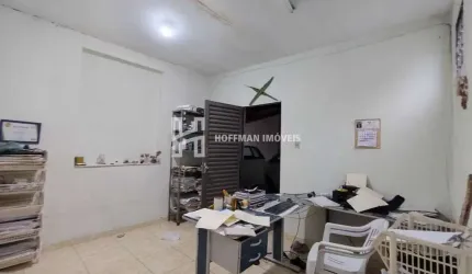 Casa com 3 Quartos, 3 Banheiros, 5 Vagas à venda - Santo Antônio