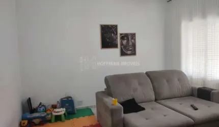 Casa com edícula