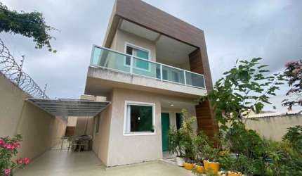 Casa em condomínio fechado com 4 quartos à venda no Abrantes, Camaçari  por R$ 690.000