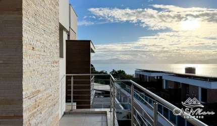 Casa em condomínio fechado com 3 quartos à venda na Rodovia Haroldo Soares Glavan, 3400, Cacupé, Florianópolis por R$ 1.600.000