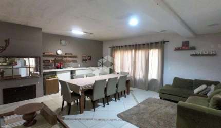 Casa 3 dormitórios com suíte vagas de garagem no Bairro Passo da Areia.