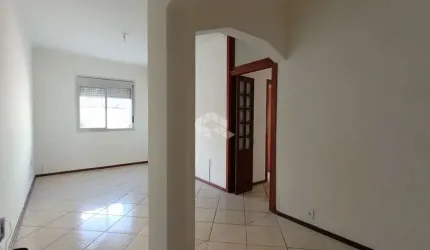APARTAMENTO TÉRREO COM TRES DORMITÓRIOS NO BAIRRO SÃO SEBASTIÃO