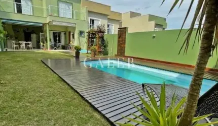 SOBRADO COM 3 SUÍTES E PISCINA