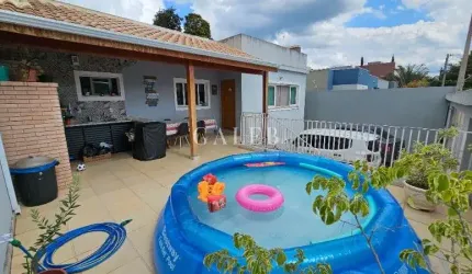 Casa térrea com 3 suítes em excelente localização