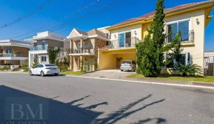 Casa em condomínio fechado, com 4 suítes, 367 m² privativos por R$ 2.500.000 - São Braz - Curitiba/PR