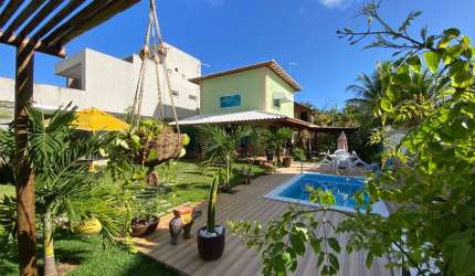 Linda casa  3 dormitórios em condomínio pé na areia