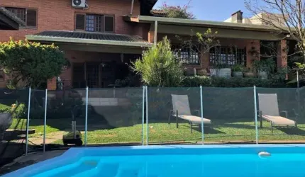 Casa em condomínio fechado com 9 quartos à venda na Rua Argentina, 201, Recanto Impla, Carapicuíba por R$ 1.800.000