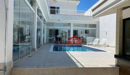 Casa com 4 dormitórios à venda, 393 m² por R$ 1.700.000 - Centro - Caraguatatuba/SP