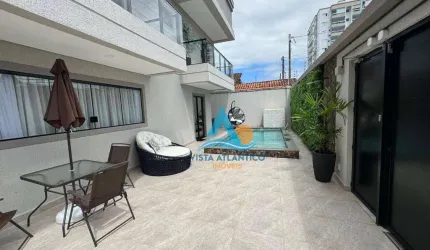 Sobrado com 3 dormitórios à venda, 140 m² por R$ 1.499.000,00 - Vila Guilhermina - Praia Grande/SP