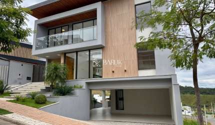 Casa com 4 suítes e 4 vagas no condomínio Estrela Alta