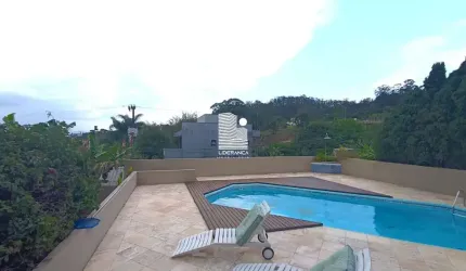 Casa em condomínio fechado com 3 quartos à venda na Estrada Haroldo Soares Glavan, --, Cacupé, Florianópolis por R$ 2.950.000