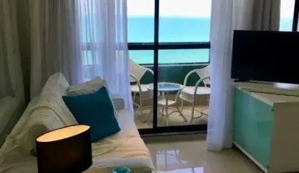Oportunidade de moradia ou investimento! Belissimo flat com vista mar para a praia de areia preta!