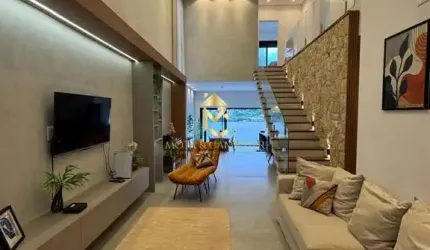 Casa com piscina e varanda Gourmet à venda em condomínio.