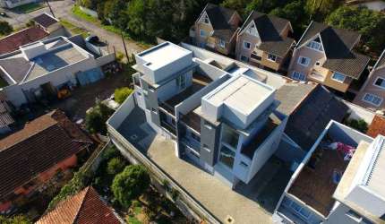 Sobrado com 3 dormitórios à venda, 117 m² por R$ 790.000,00 - Uberaba - Curitiba/PR