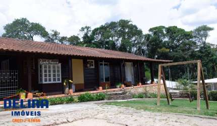 Chácara à venda ou locação em Terra Preta de 12 mil m² completa.