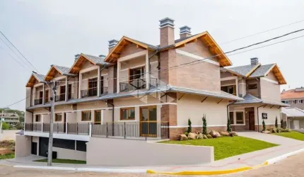 Sobrado com 02 suítes e vaga coberta