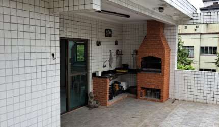 Casa sobreposta alta, 490 m², 5 dormitórios, no Embaré.  ‌