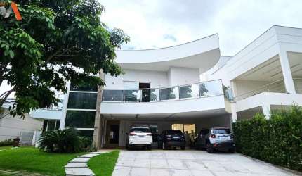 -COP 30 - CASA DE 2 PAVIMENTOS COM 6 SUÍTES + 1 QUARTO + GABINETE NO CONDOMÍNIO ÁGUA CRISTAL! -ÁREA PRIVATIVA: 1.800M². -03 VAGAS DE GARAGEM