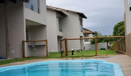 VILLAGE NOVO PRÓXIMO A PRAIA, DOIS DORMITÓRIOS  SUITES, 70m² COM 20m²DE ÁREA GOURMET, NASCENTE A 15