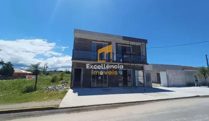 Sobrado comercial novo no litoral