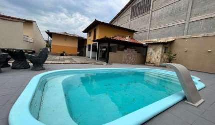 Casa com 4 dormitórios, 300 m² - venda por R$ 1.400.000,00 ou aluguel por R$ 10.000,00/mês - Parque Hotel - Araruama/RJ