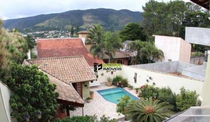 Casa com 3 dormitórios, 401 m² - venda por R$ 2.250.000,00 ou aluguel por R$ 15.628,21/mês - Vila Petrópolis - Atibaia/SP