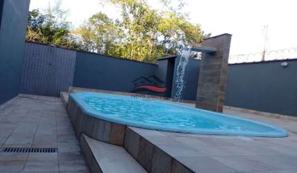 Linda casa com piscina próximo a praia do Massaguaçu- Caraguatatuba-SP