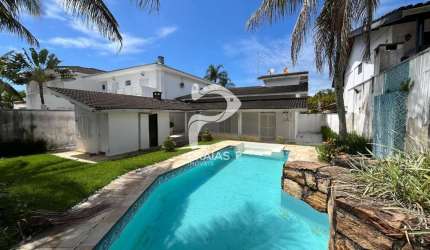 Casa em condomínio fechado com 3 quartos à venda na Doutor Cyro de Mello Pupo (rua 53), --, Jardim Acapulco, Guarujá por R$ 1.300.000