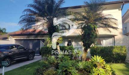Casa em condomínio fechado com 4 quartos à venda na Victorio Arthur Cavini (rua 01), --, Jardim Acapulco, Guarujá por R$ 2.900.000
