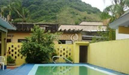 Casa com 4 quartos à venda no Jardim Guaiuba, Guarujá  por R$ 1.100.000