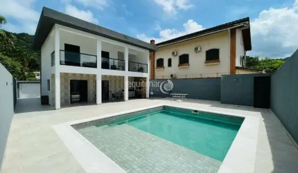 Casa em condomínio fechado com 4 quartos à venda no Balneário Praia do Pernambuco, Guarujá  por R$ 1.500.000