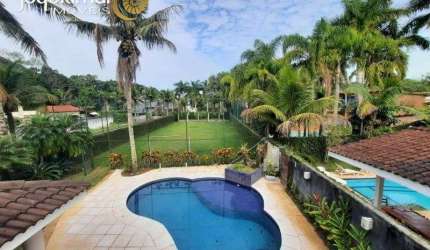 Casa em condomínio fechado com 5 quartos à venda no Balneário Praia do Pernambuco, Guarujá  por R$ 3.200.000
