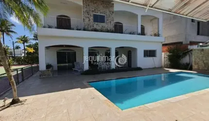 Casa em condomínio fechado com 7 quartos para alugar no Jardim Acapulco, Guarujá  por R$ 17.000